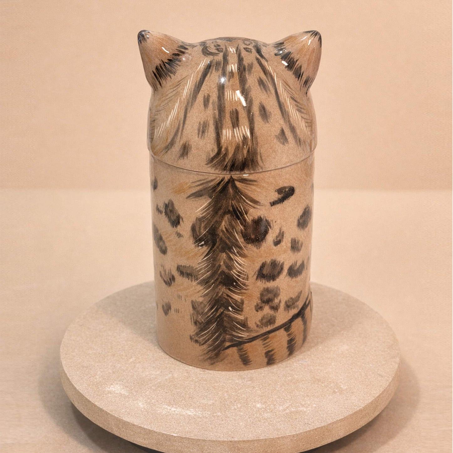 Handcrafted ceramic cat urn back view showing hand-painted fur and tail detail